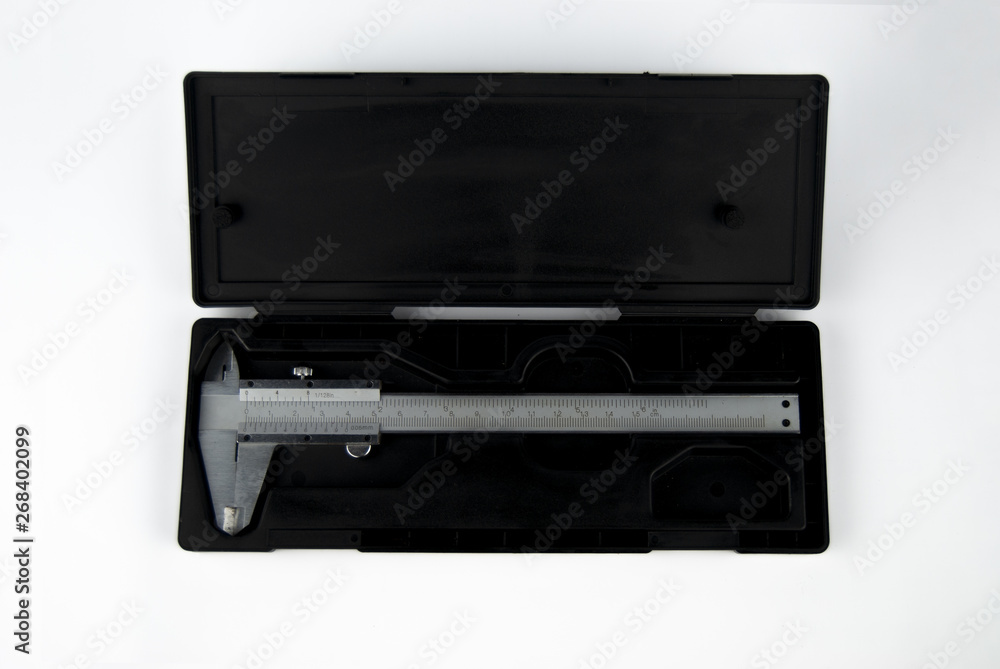 vernier caliper metal with product container box packaging on plain isolated white background vernier caliper metal with product container box packaging on plain isolated white background