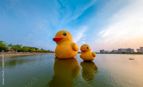 Canvastavla Floating yellow rubber ducks at sunset on the Nong Prajak lake at Udon Thani, Thailand