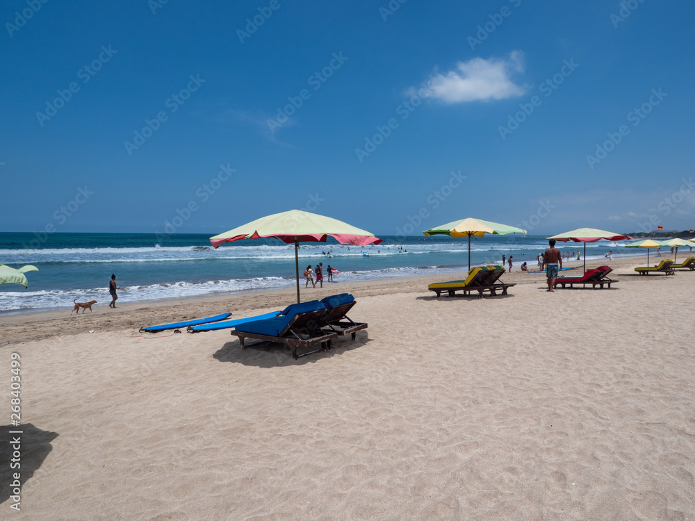 Bali, November 2019: Located on the western side of the island's narrow isthmus, Kuta Beach is Bali's most famous beach resort destination. Indonesia