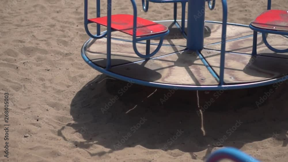 Carousel on the playground on a sunny day Carousel on the playground on a sunny day