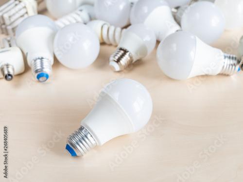 one LED bulb light and many different lamps