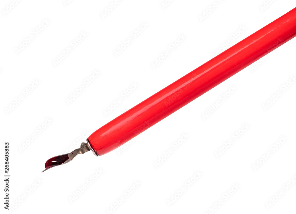big red ink drop atop of sharp nib of dip pen big red ink drop atop of sharp nib of dip pen