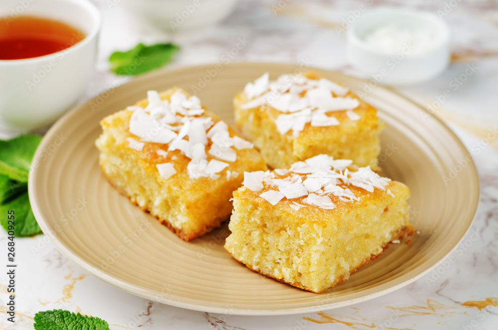 Coconut Breakfast Bars with fresh coconut sprinkle