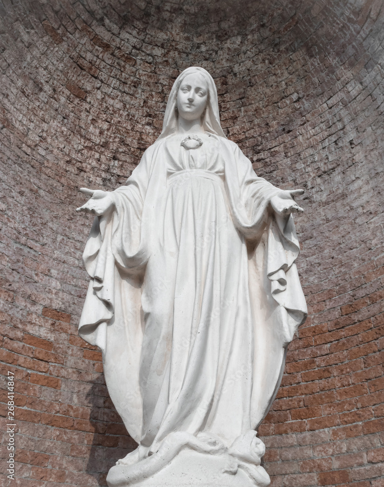 Statue in stone of Virgin Mary