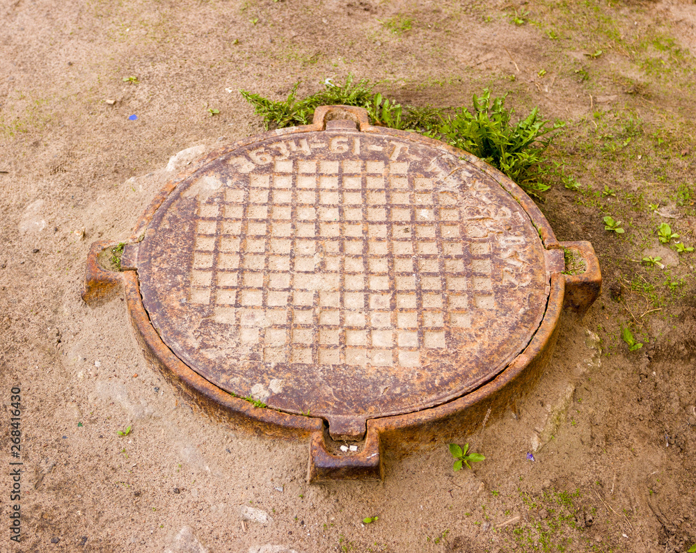 round rusty cast iron drain well hatch round rusty cast iron drain well hatch