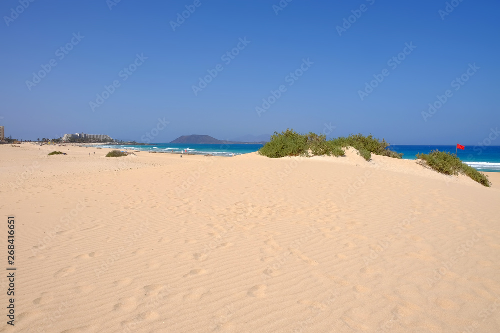 Sand Dunes and beach in National Park Corralejo, Fuerteventura.