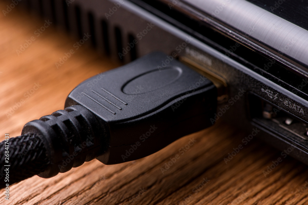HDMI cable close-up. HDMI connector. HDMI plug HDMI cable close-up. HDMI connector. HDMI plug