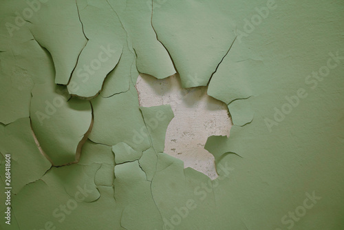 old wall background with peeling paint photo