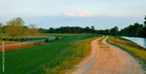 Levee between the Mississippi River and River Road near Baton Rouge, Louisiana, USA.