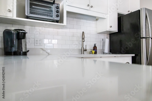 Small White Kitchen in a Co...