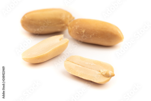 dried  peanuts with shell on white background