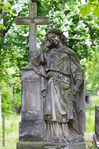 Historic Statue on the mystery old Prague Cemetery, Czech Republic