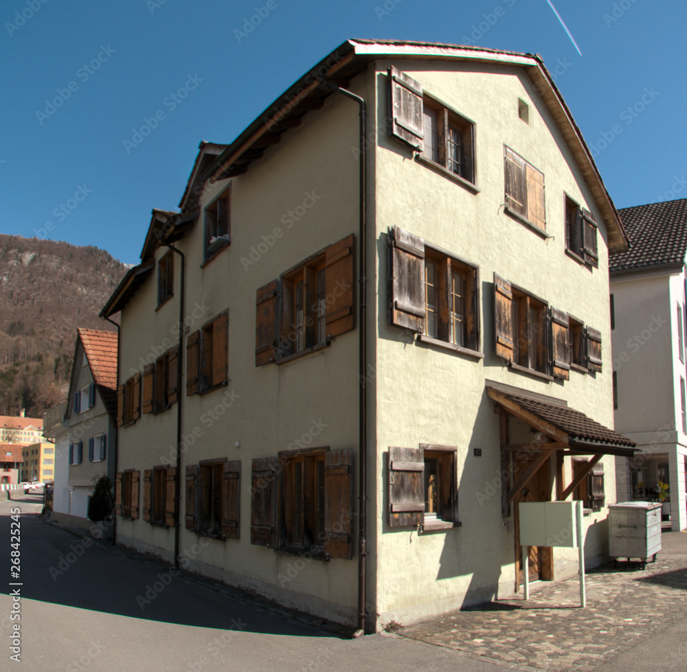 Fototapeta premium Traditional Swiss house with shutters in Walenstadt, Sankt Gallen
