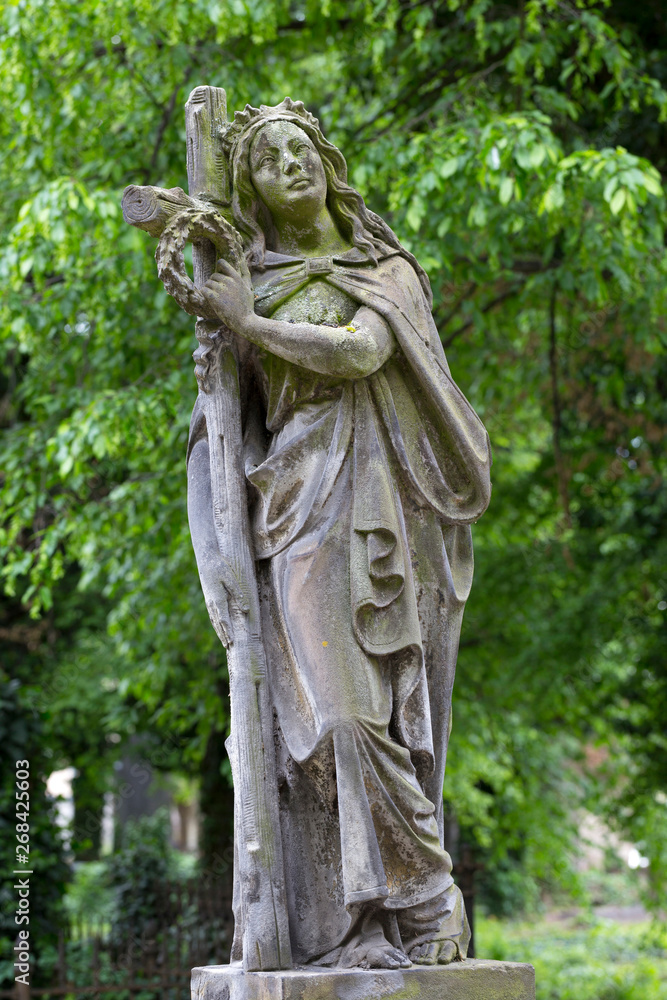 Historic Statue on the mystery old Prague Cemetery, Czech Republic