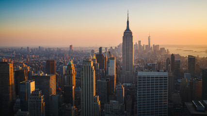 Wandcirkels Empire State Building Wolkenkrabbers New York bij zonsondergang  © heyengel