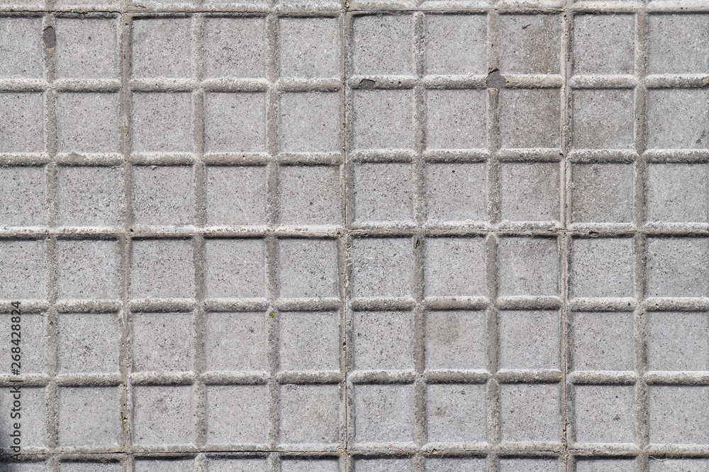 Old tiles on the city floor. Bas-relief? Where is the sun? North or south! Old tiles on the city floor. Bas-relief? Where is the sun? North or south!