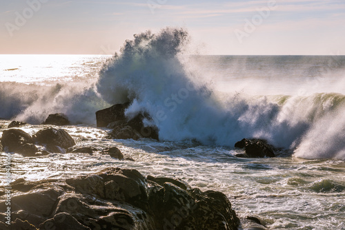 Waves of Atlantic Ocean crashing on rocks in Porto, Portugal