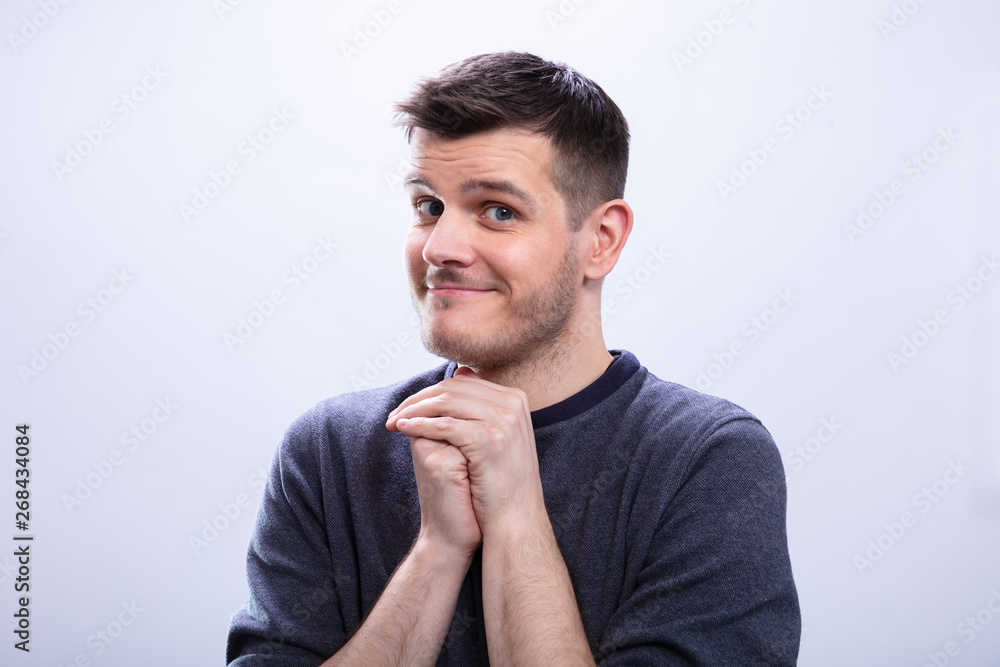 Man Day Dreaming Against White Background