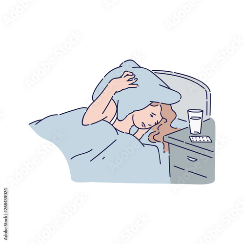 Woman with insomnia having sleep problem in bedroom from loud noise and headache