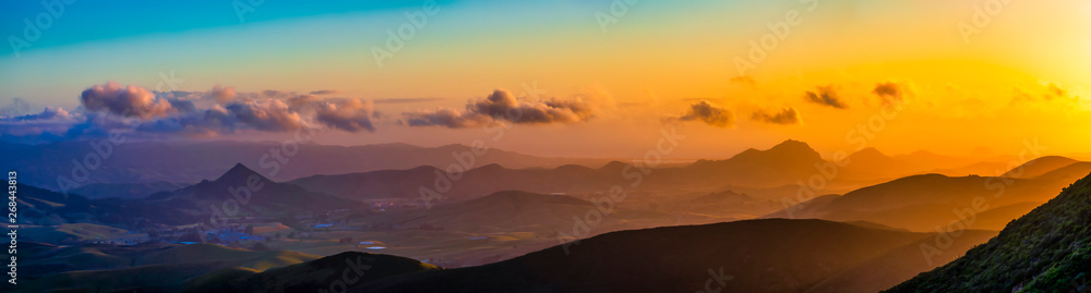 Panorama Sunset over Mountains and Valleys