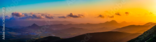 Panorama Sunset over Mountains and Valleys