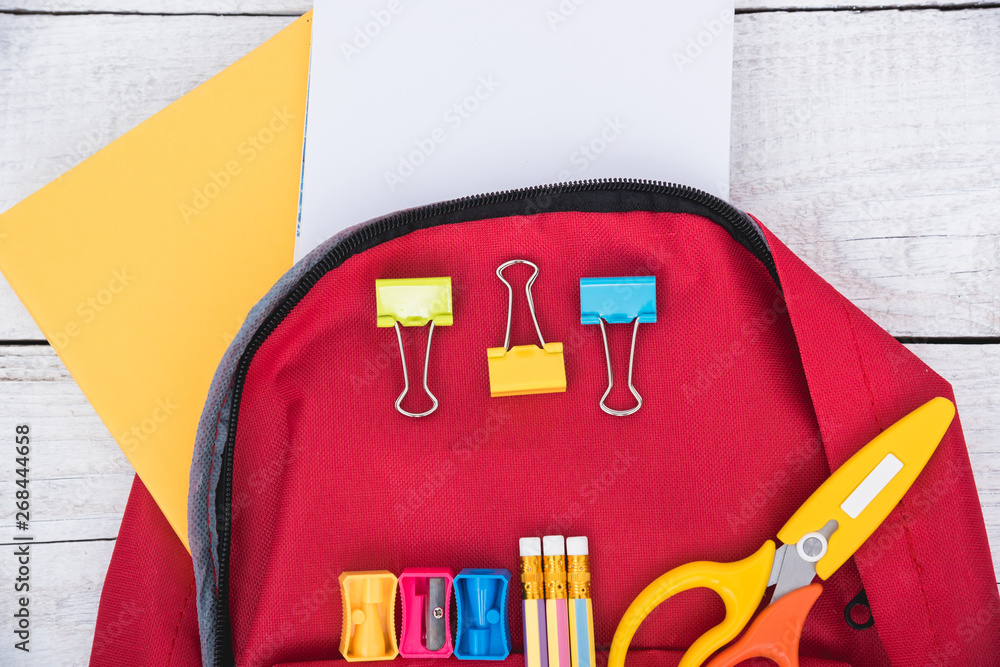Naklejka premium Top view Red bag backpack for education children