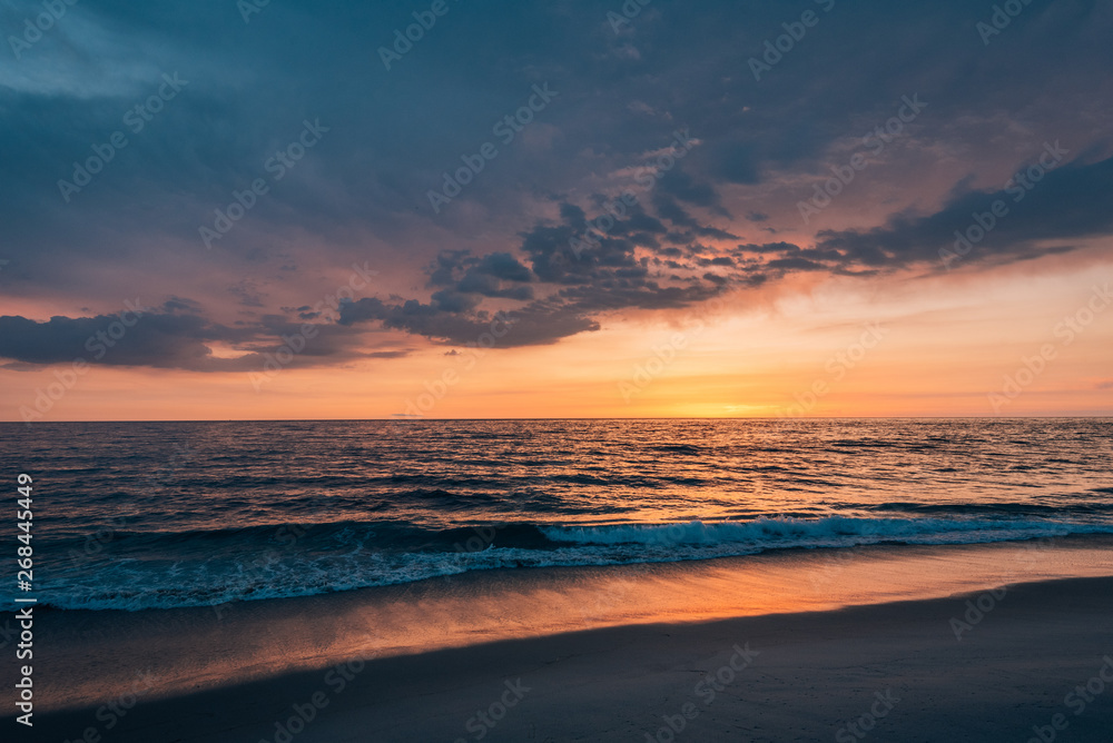 Colorful sunset over the Pacific Ocean, at Windansea Beach, in La Jolla, San Diego, California