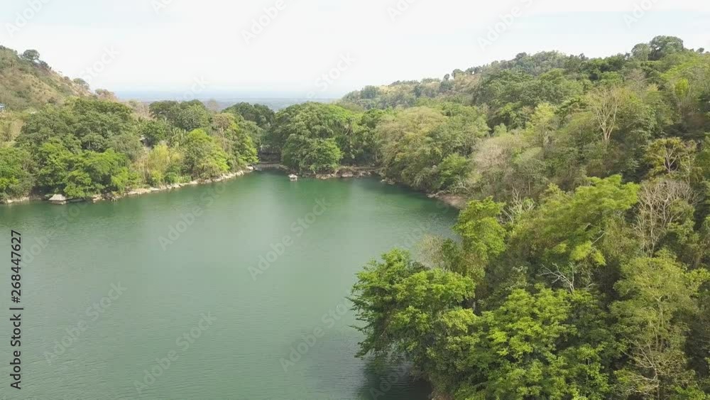 Nature background with lake among the mountains on tropical island, aerial view. Nature background with lake among the mountains on tropical island, aerial view.