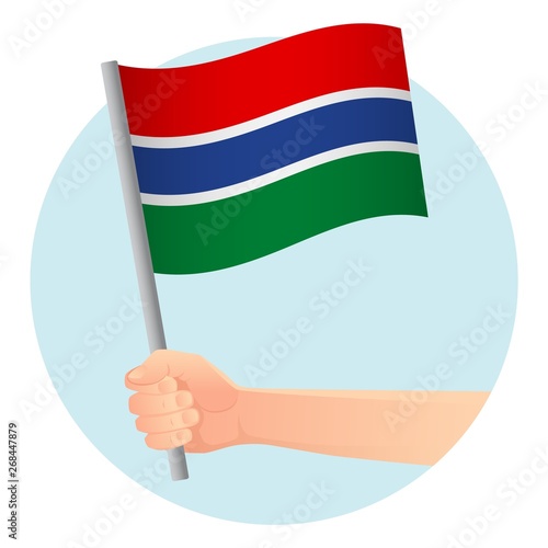 Gambia flag in hand