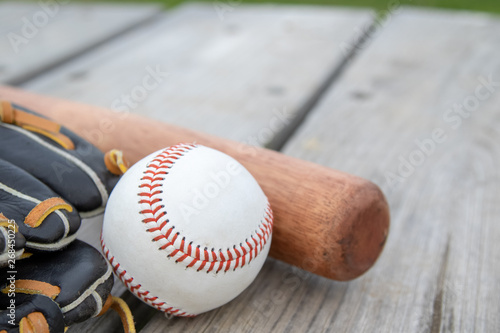 Photography close up of base equipment mitt ball and glove full wooden background