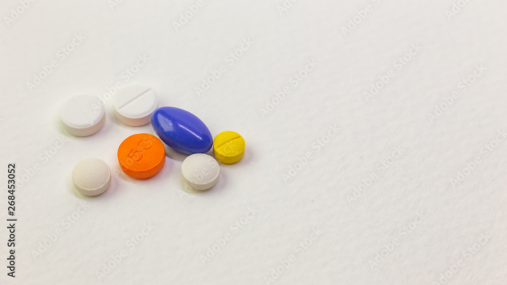 medical drugs on white background close up image. medical drugs on white background close up image.