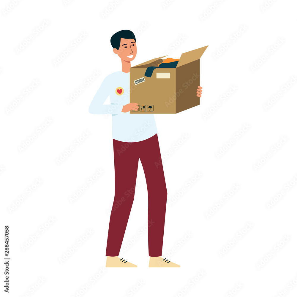 Volunteer holding box of clothes donation Volunteer holding box of clothes donation