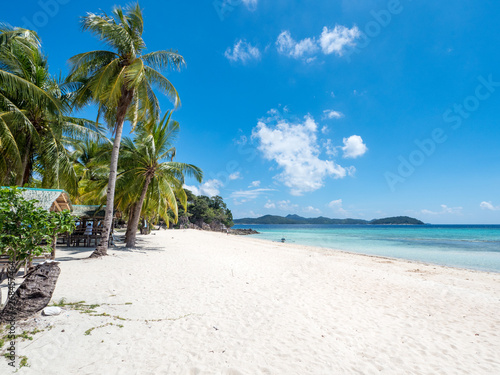 Tropical beach with white sand on the Malcapuya Island, Busuanga, Palawan, Philippines. Beautiful tropical island with sand beach. Travel concept. November, 2018 © ikmerc