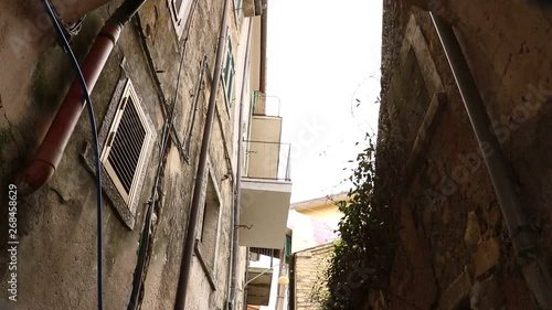 Street of the ancient village of Colonnata, famous for the production of lard. The ancient village of white marble quarrymen is located above Carrara, in northern Tuscany. photo