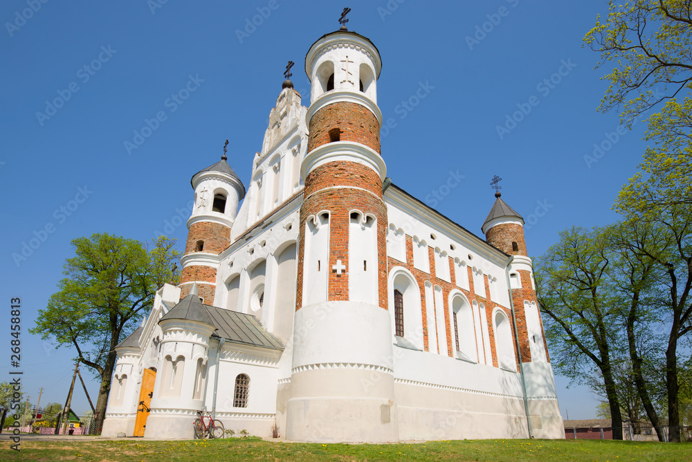 The old fortified church of the Nativity of the Virgin Mary close up on a sunny April day. Murovanka, Belarus