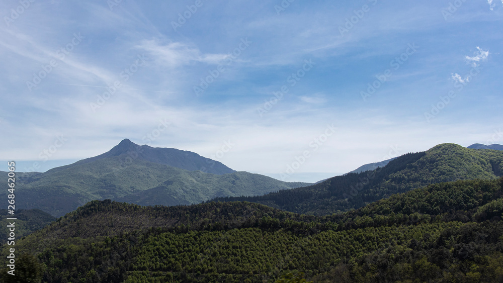 Green mountain plain landscape on a blue sky in Catalonian Pyrenees