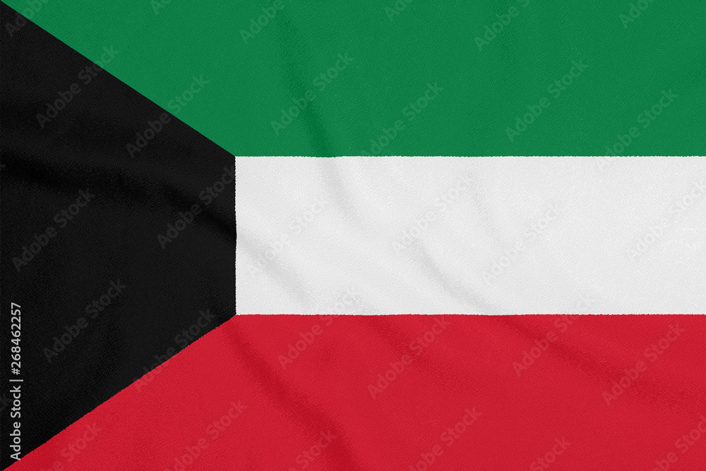Fototapeta premium Flag of Kuwait on textured fabric. Patriotic symbol