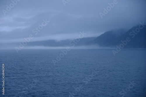 Early morning mist in Milford Sound