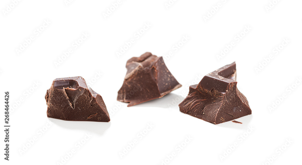 Chocolate pieces  isolated on white background .
