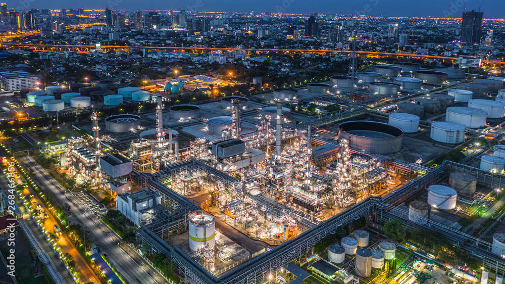 Naklejka premium Aerial view oil refinery, refinery plant, refinery factory at night.
