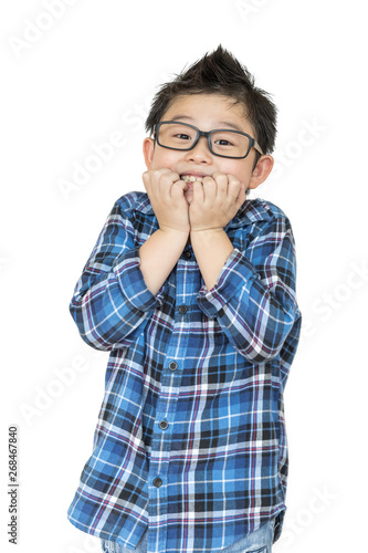 Back to school. Little child in glasses feels like shock when time to school on white background on isolated