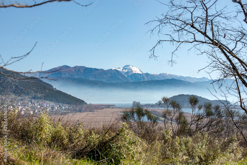 View of Pamvotis lake.Houses and fields,Ioannina city, Epirus, Greece View of Pamvotis lake.Houses and fields,Ioannina city, Epirus, Greece