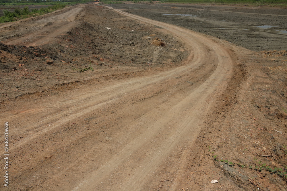 Naklejka premium The dirt road used for suburban traffic in Thailand - Image