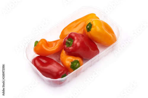 Fresh sweet bell peppers, ingredients for cooking, close-up, isolated on white background