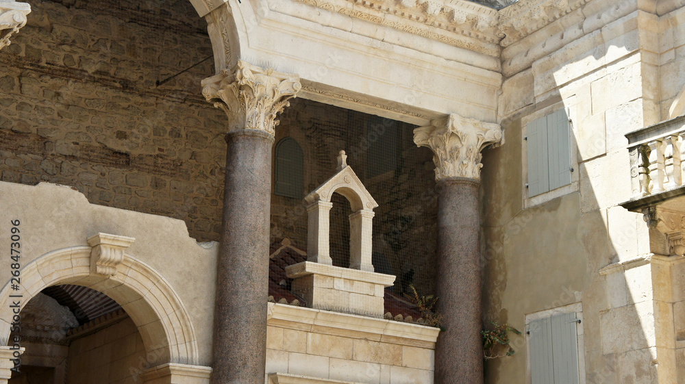 Fototapeta premium View of the part of Peristyle of Diocletian's Palace in old town, beautiful architecture, sunny day, Split, Croatia