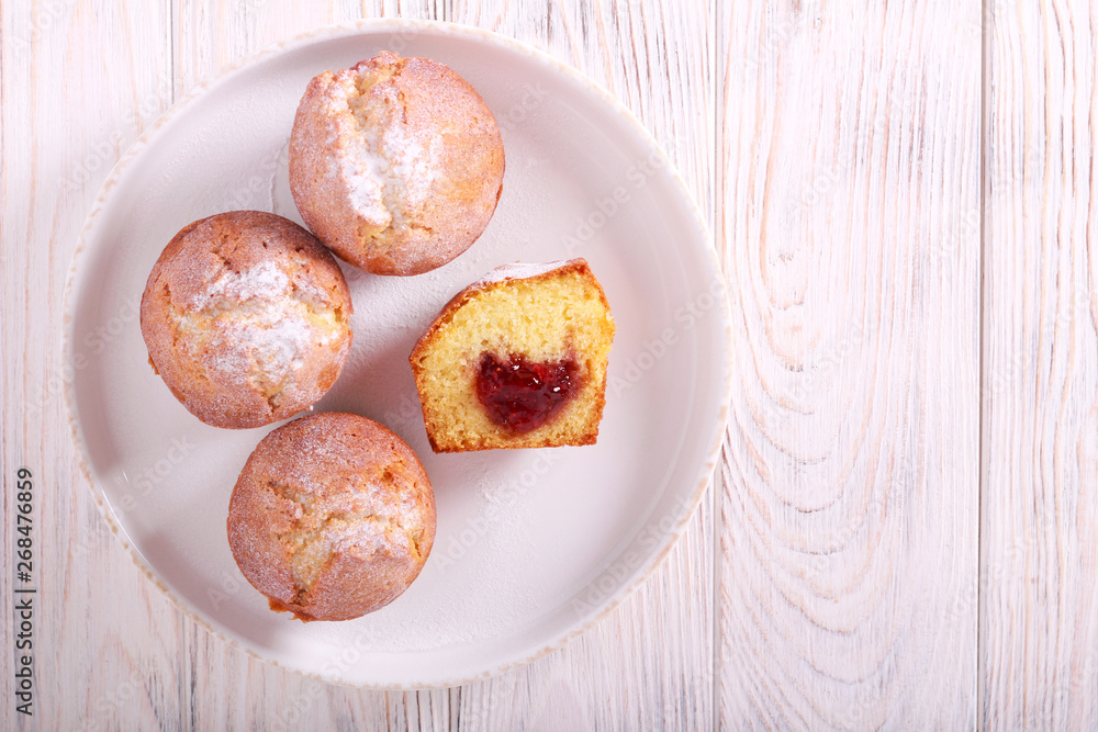 Fotografie Doughnut muffins with jam filling