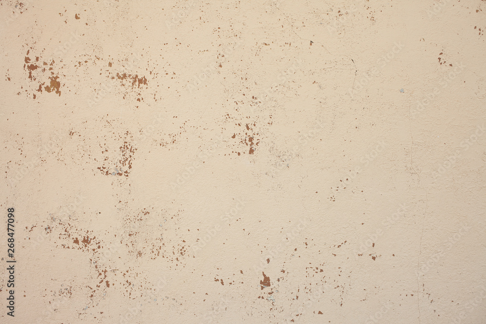 Old peeling beige wall, texture background Old peeling beige wall, texture background