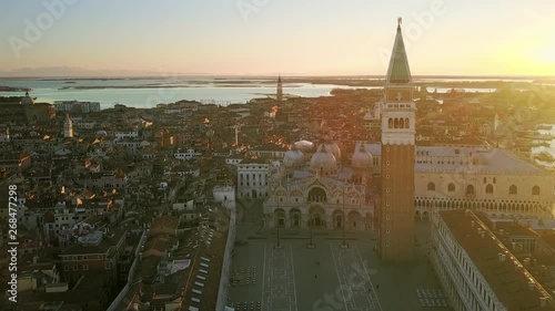 aerial view of venice st mark square drone coming out from an old balcony italy