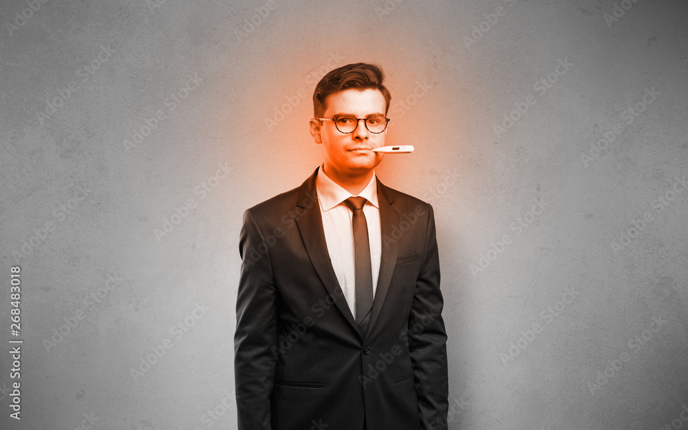 Fever businessman with burning red head concept
Fever businessman with burning red head concept