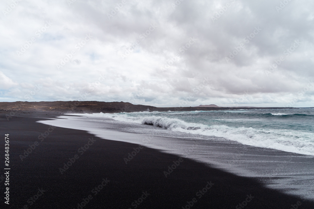 A view of a beach of Lanzarote, Canary Islands, Spain. A view of a beach of Lanzarote, Canary Islands, Spain.